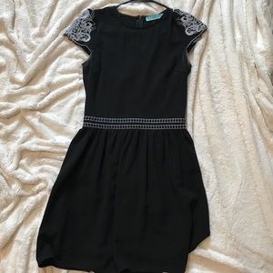 Francesca’s black dress